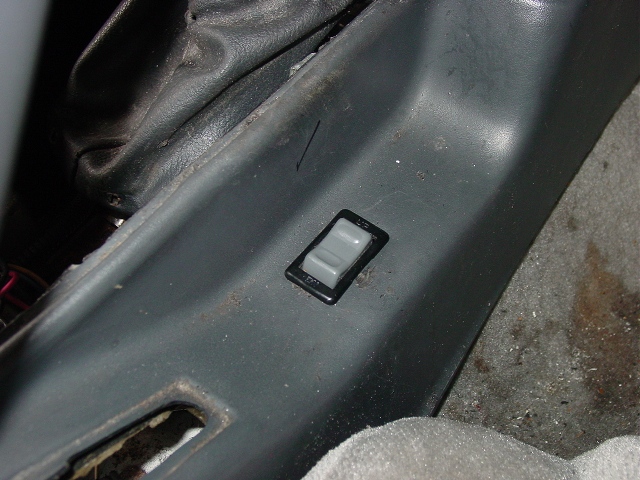 Power window switch relocated