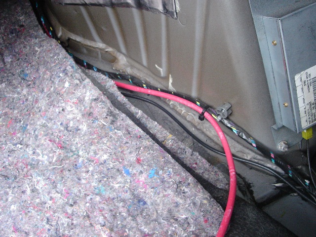 dressing wires in the trunk