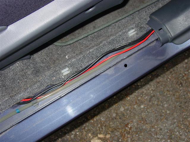 Radio wiring in rocker panel