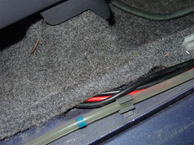 Radio wiring leaving rocker panel
