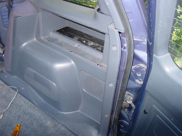 Removing rear trim for antenna wiring