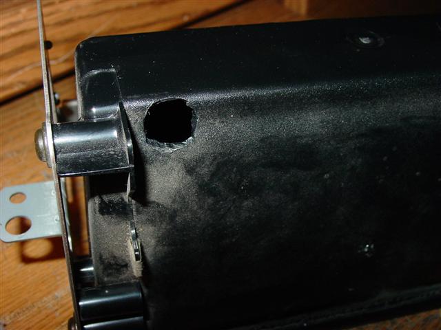 Hole in dash pocket for data cable