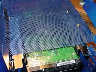 HDD Slung under tray.